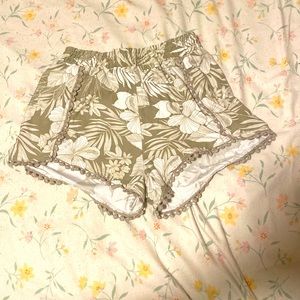 I am selling White and gray shorts From our deans they are one year old